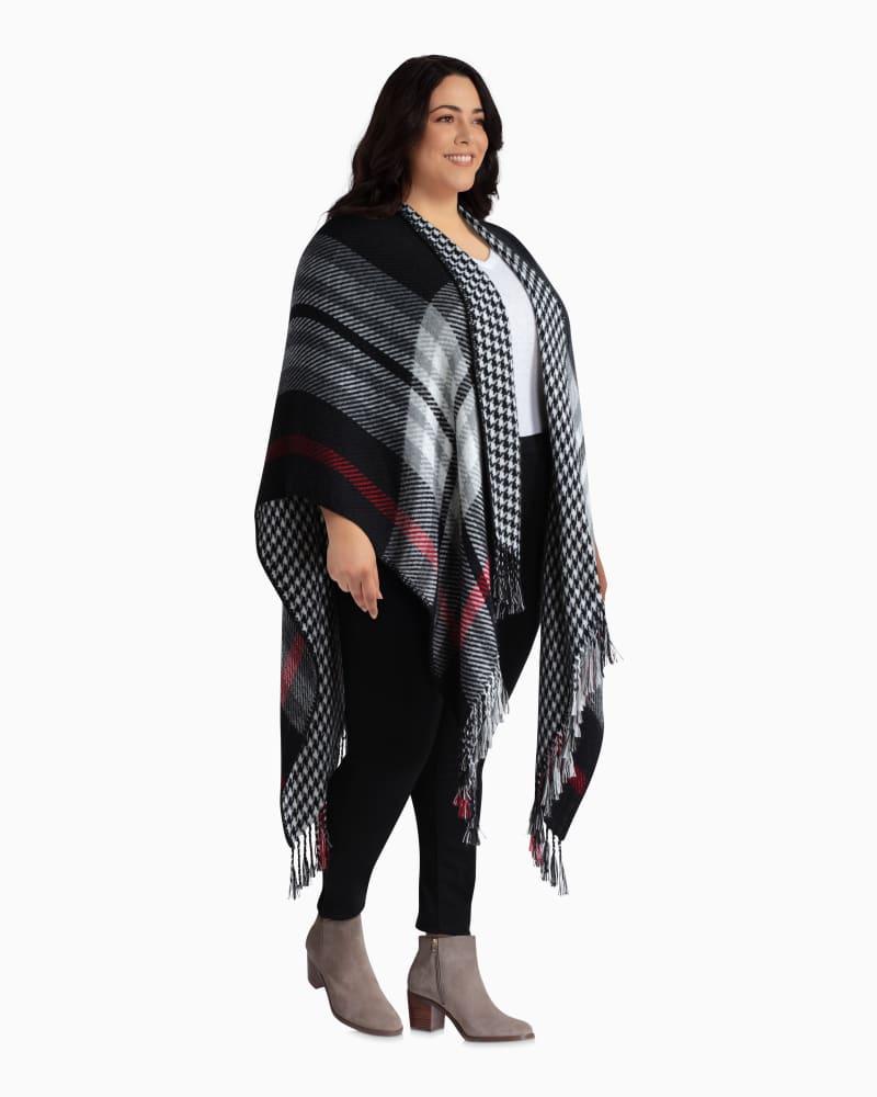 Plus size model with rectangle body shape wearing Areca Reversible Fringe Poncho by Junarose | Dia&Co | dia_product_style_image_id:110974